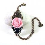 Bronzed Filigree With Light Pink Resin Flower And..