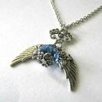 Antiqued Silver Wings Necklace Light Blue Crystal..