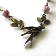 Swallow necklace jewelry with leaves and light purple Czech melon glass beads